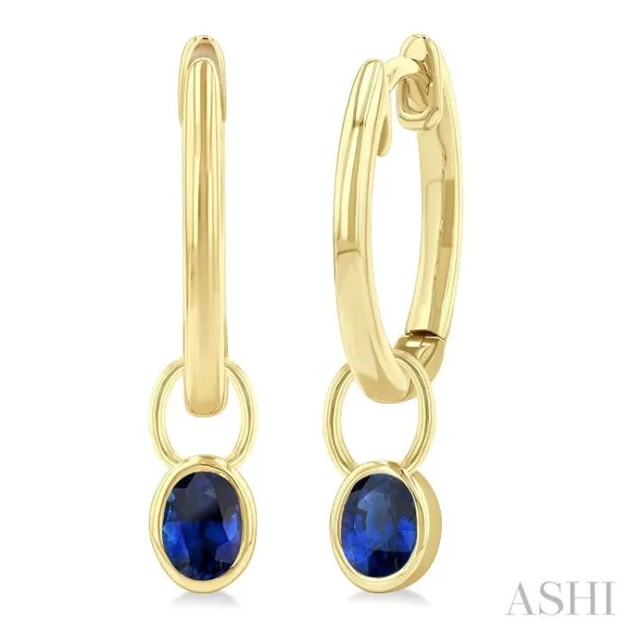 5×3 MM Bezel Set Oval Cut Sapphire Precious Fashion Huggie Earrings in 10K Yellow Gold