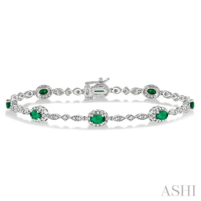 5×3 MM Oval Cut Emerald and 1/20 Ctw Single Cut Diamond Bracelet in 14K White Gold