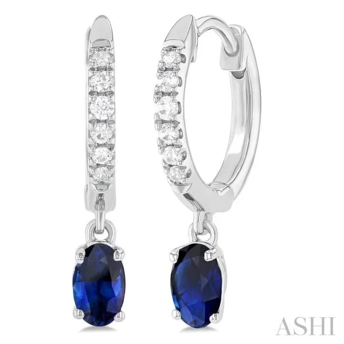 5×3 MM Oval Cut Sapphire and 1/8 Ctw Petite Round Cut Diamond Precious Fashion Huggies in 10K White Gold