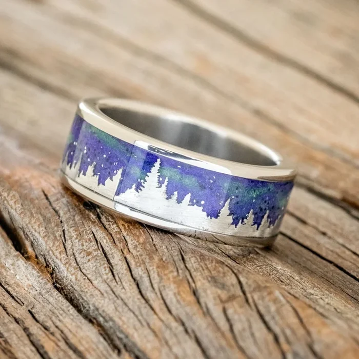 “BOREALIS” – SILVER TREES ENGRAVED WEDDING RING WITH GLOW IN THE DARK NORTHERN LIGHTS