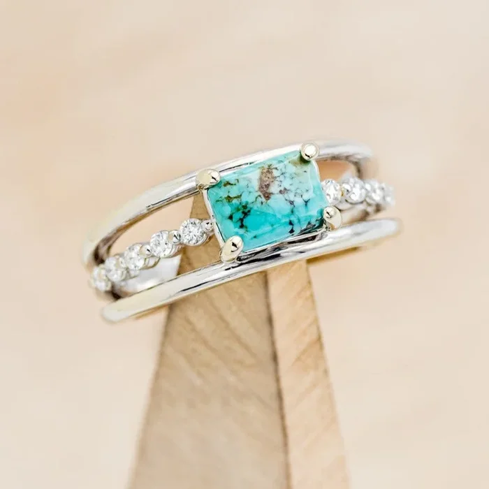 “DOLLY” – EMERALD CABOCHON CUT TURQUOISE ENGAGEMENT RING WITH DIAMOND ACCENTS