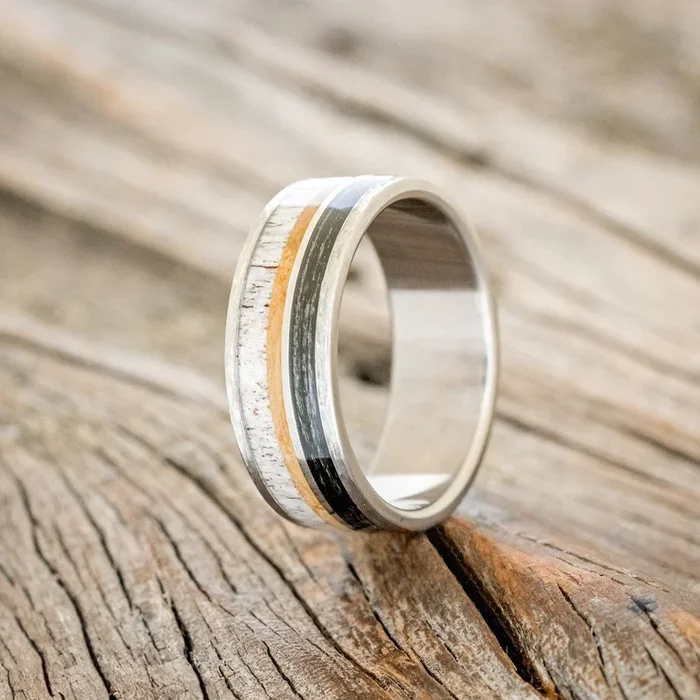 “ELEMENT” – FISHING LINE, ANTLER & WHISKEY BARREL WEDDING BAND IN A HAMMERED FINISH