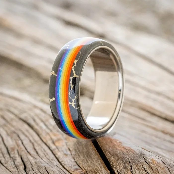 “HAVEN” – PRIDE INSPIRED WEDDING BAND WITH BLACK & GOLD TRUSTONE