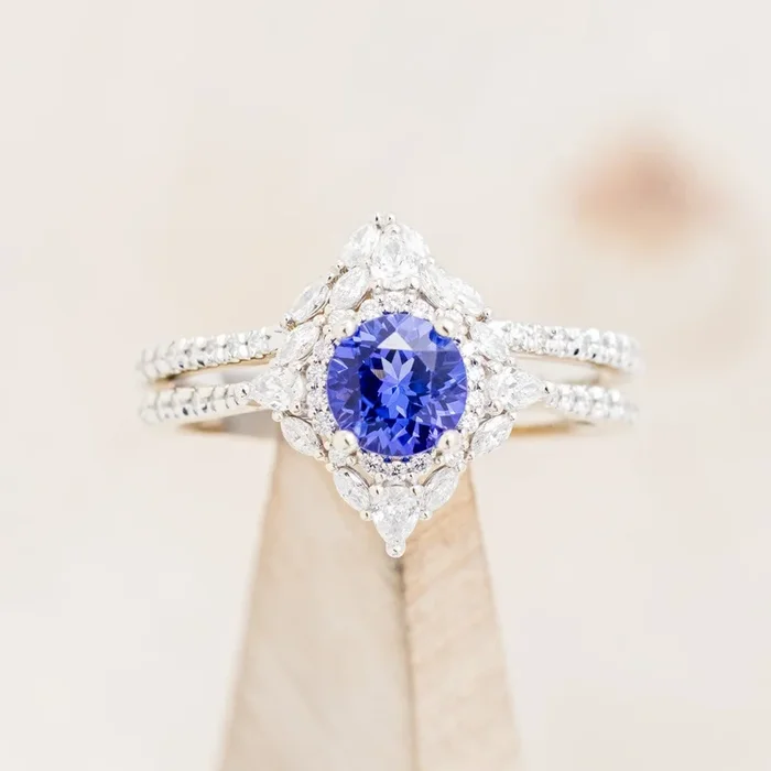 “NORTH STAR” – ROUND CUT TANZANITE ENGAGEMENT RING WITH DIAMOND ACCENTS & TRACER