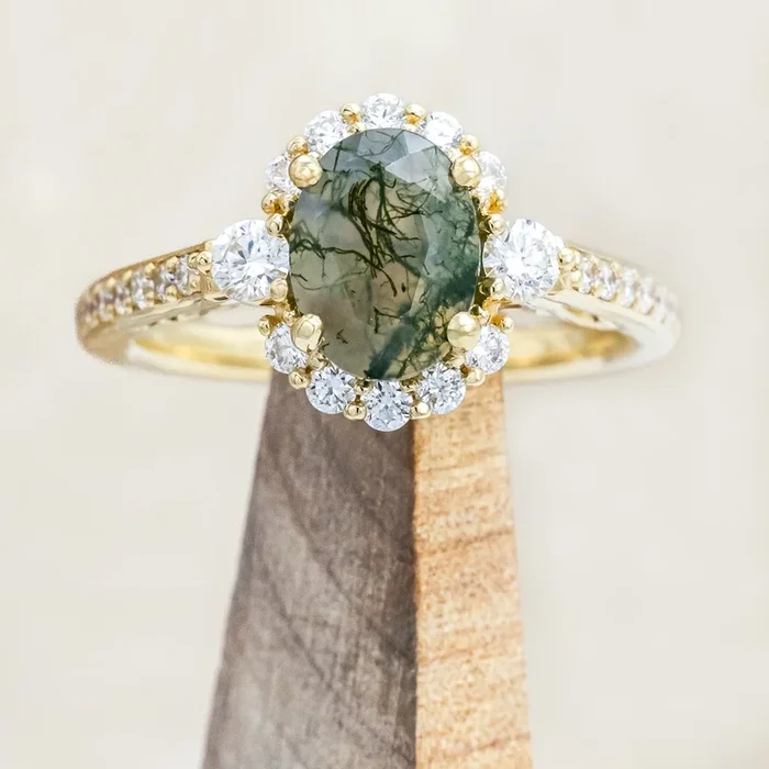 “OPHELIA” – OVAL CUT ENGAGEMENT RING WITH DIAMOND HALO & ACCENTS