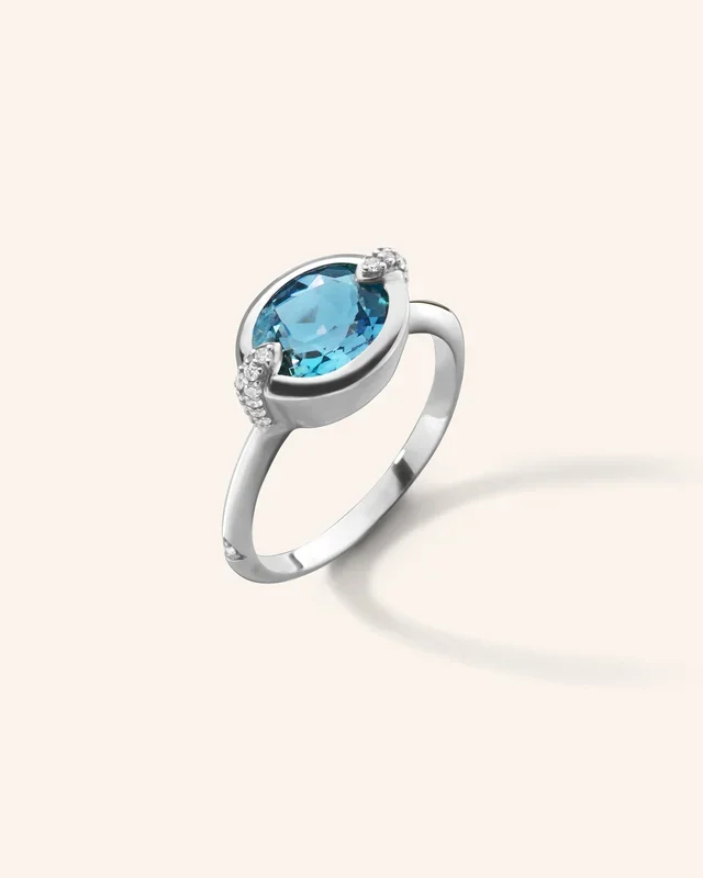 “Points North” Deep-Set Oval London Blue Topaz Ring