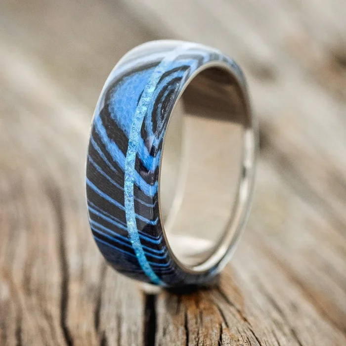 “REMMY” – BLUE & BLACK WAVE WEDDING BAND WITH A BLUE OPAL INLAY