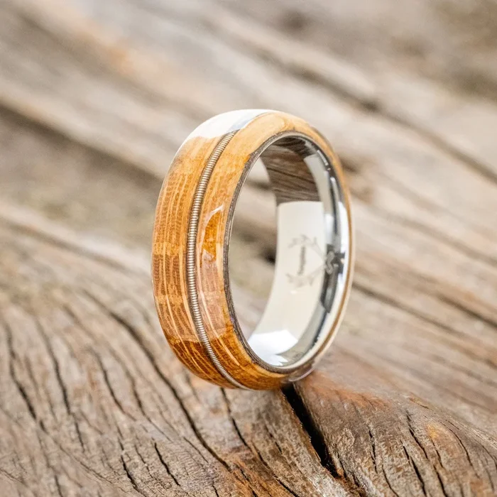 “REMMY” – WHISKEY BARREL OAK & GUITAR STRING INLAY WEDDING BAND