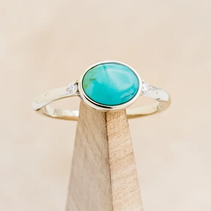 “SASI” – OVAL CUT ENGAGEMENT RING WITH DIAMOND ACCENTS