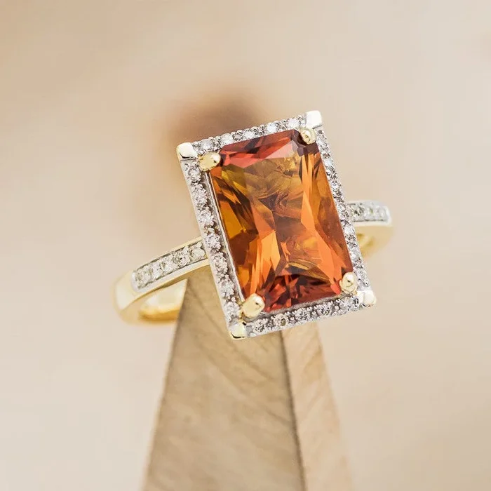 “SIENNA” – EMERALD CUT MADEIRA CITRINE ENGAGEMENT RING WITH DIAMOND HALO & ACCENTS