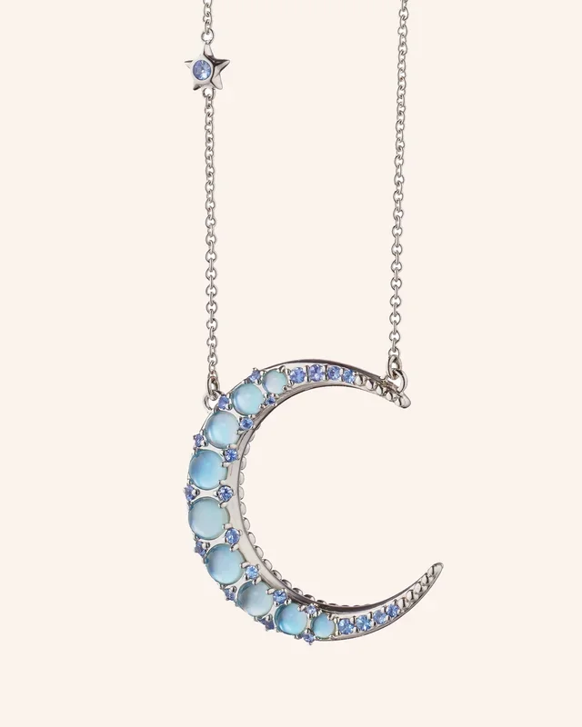 “Sun, Moon, and Stars” Crescent Moon Necklace with Blue Topaz and Sapphires