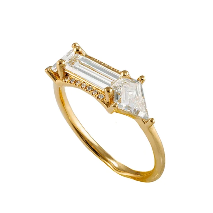 Baguette cut engagement ring with kite diamonds