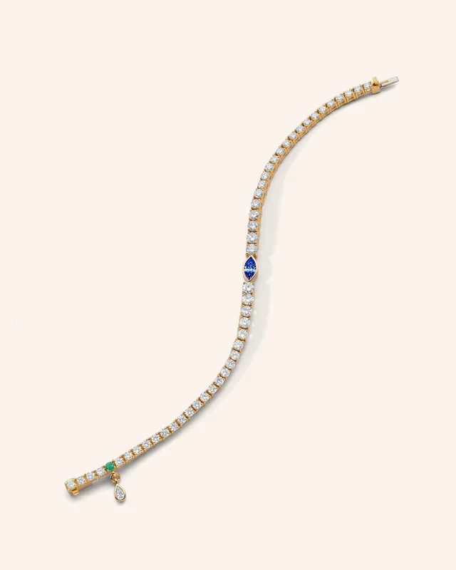 Center Marquise Blue Sapphire and Round Diamond Tennis Bracelet