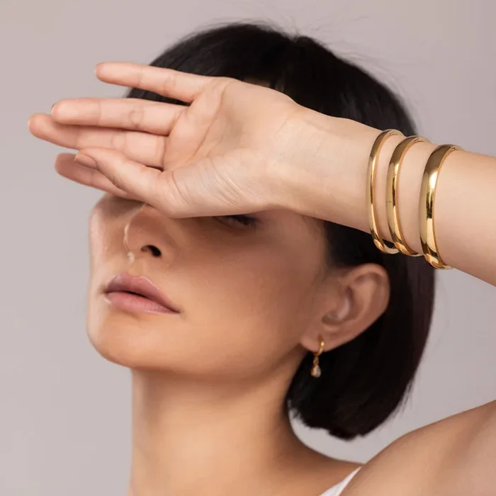Elliptical Grace Gold Bangle Bracelet