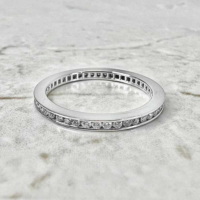 Fine Handcrafted Platinum Channel-Set 1/2 Carat Diamond Eternity Band Ring By Carvin French