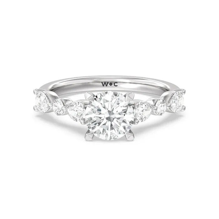 Glamorous Fancy Side Stone Hidden Halo Engagement Ring