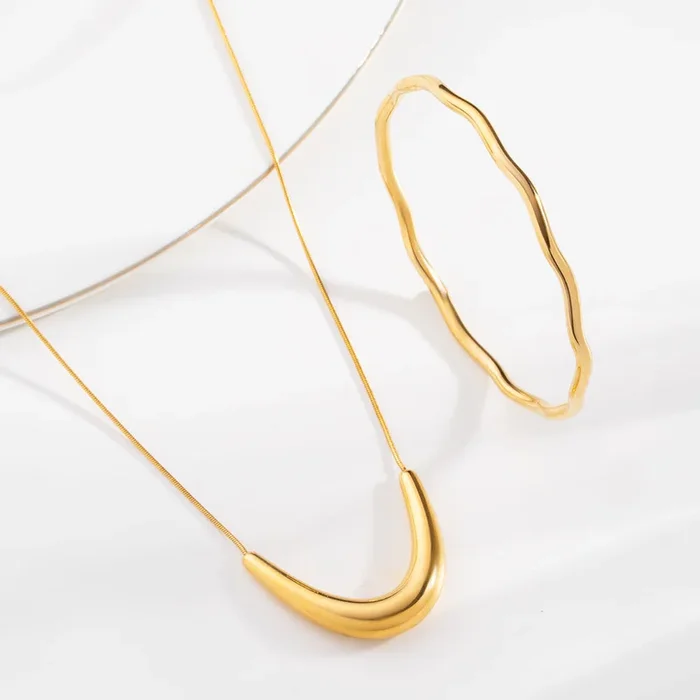 Golden Boomerang Necklace & Wave Bracelet Combo Set