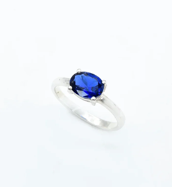 Horizontally Set Oval Sapphire Solitaire Ring in Silver