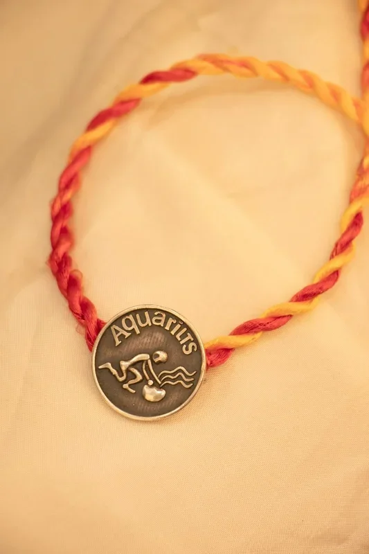 Moh Aquarius Sun Sign Brooch Cum Rakhi