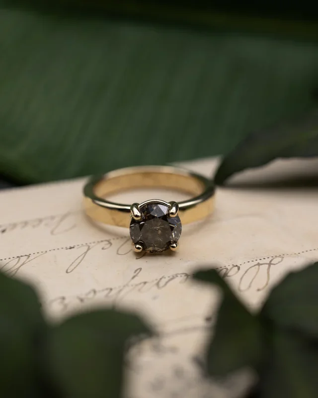 ONE-OF-A-KIND – “SALMA” – WIDE BAND SOLITAIRE ENGAGEMENT RING WITH ROUND CUT SALT & PEPPER DIAMOND