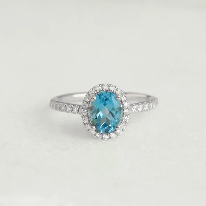 Oval Swiss Blue Topaz Halo Ring White Gold – Suna