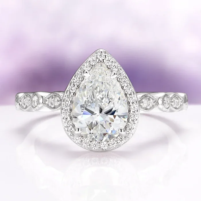 Pear Cut Moissanite Engagement Ring in 14K White Gold
