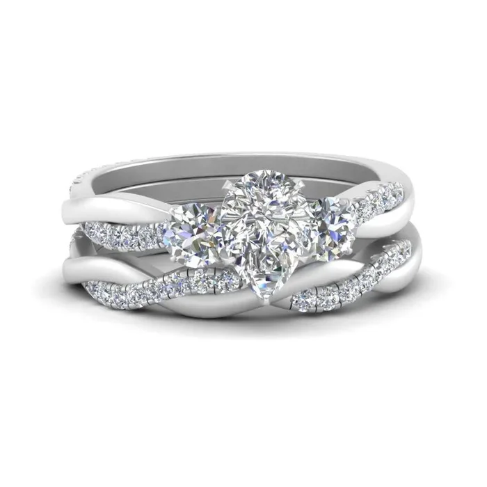 Pear Shaped 3 Stone Twist Engagement Ring And Band