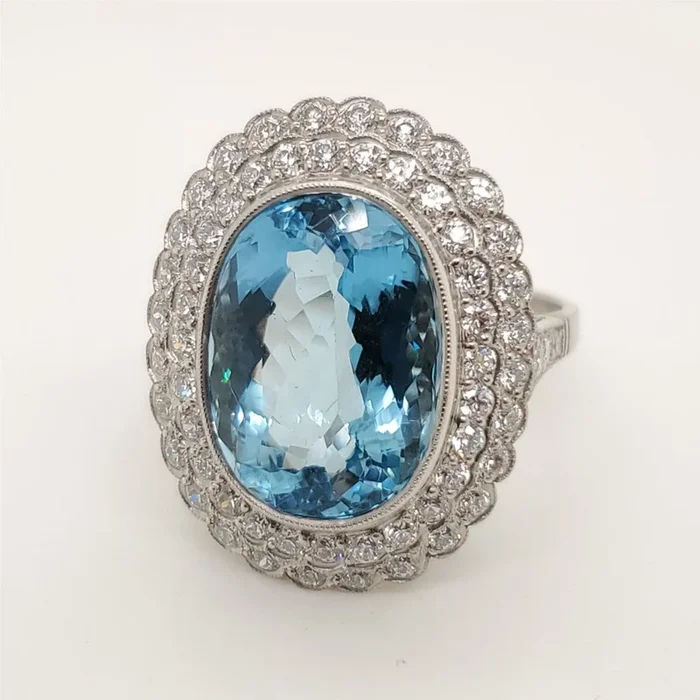 Platinum 7.08 Carat Oval Santa Maria Color Aquamarine and Diamond Ring
