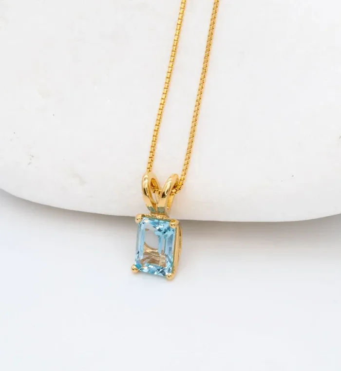 Rectangular Blue Topaz Solitaire Pendant in Gold