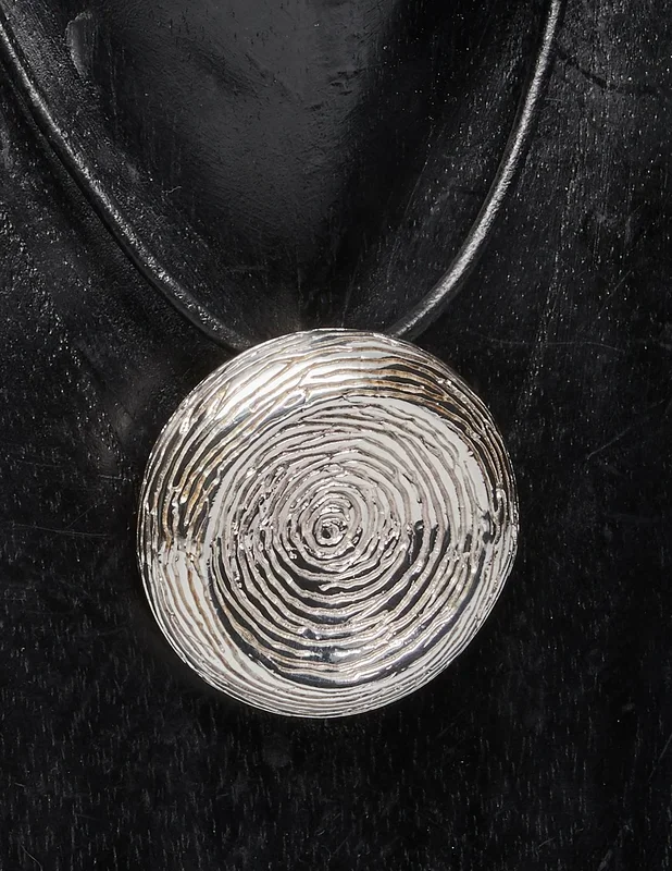 Round Sterling Silver Pendant with Lined Texture