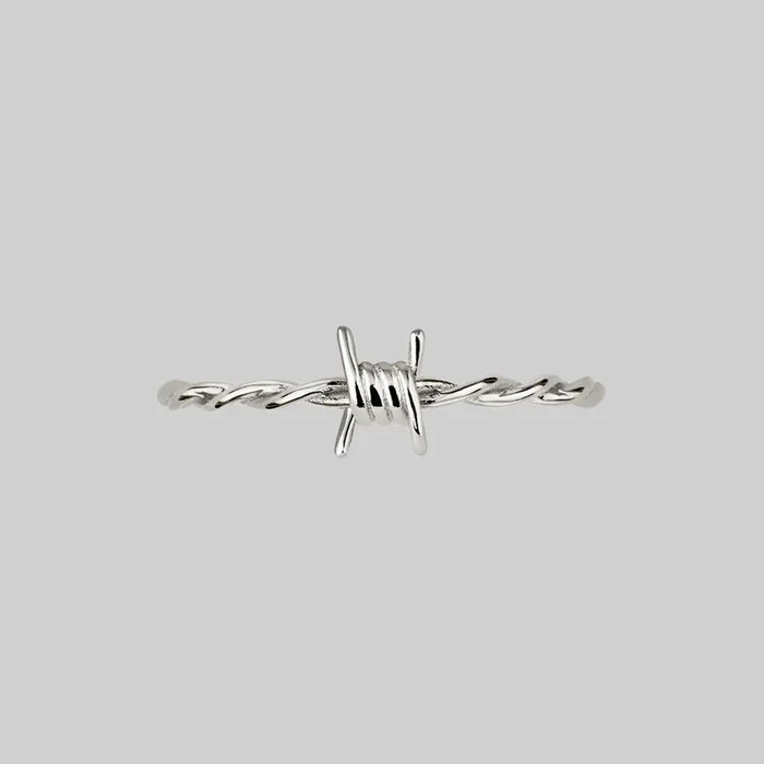 SURVIVAL. Symbolic Barbed Wire Ring – Silver