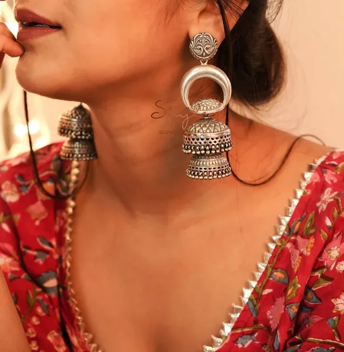 Tattva Peacock Motif Embossed Layered Statement Jhumka