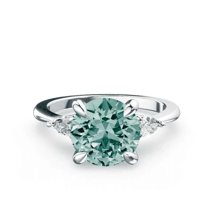 Three Stone Green Diamond Ring