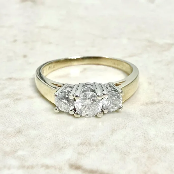 Vintage 14 Karat Two-Tone 0.60 Carat Diamond Three-Stone Ring