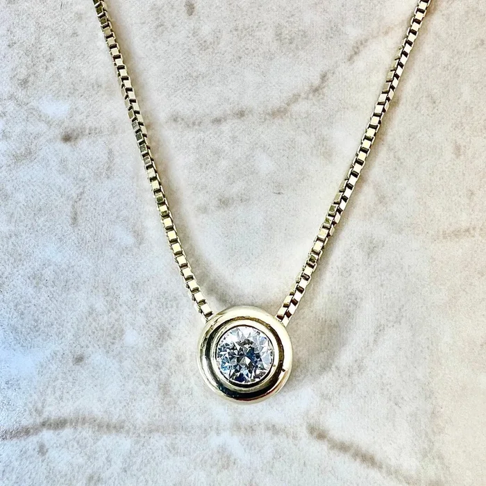 Vintage 14 Karat Yellow Gold Bezel-Set 0.25 Carat Old European Cut Diamond Solitaire Necklace
