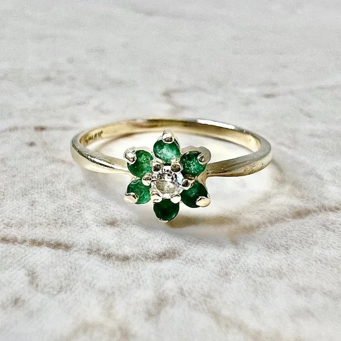 Vintage 14 Karat Yellow Gold Natural Emerald & Diamond Halo Ring