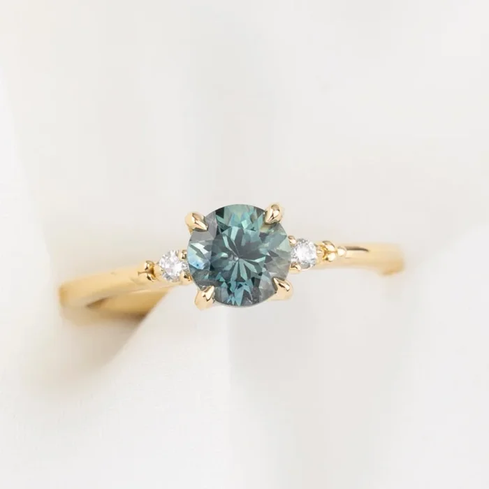 【一点物】エステルリング ・1.04ct・加熱モンタナ産ライトパルティブルーグリーンサファイア・K14YG